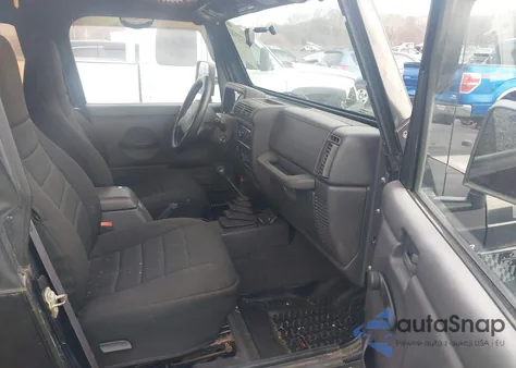 1999 Jeep Wrangler Sport z USA, uszkodzony, nr VIN 1J4FY19S5XP482862